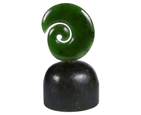 A Maori Nephrite Jade Koru Symbol:On nephrite base, H 7 cm