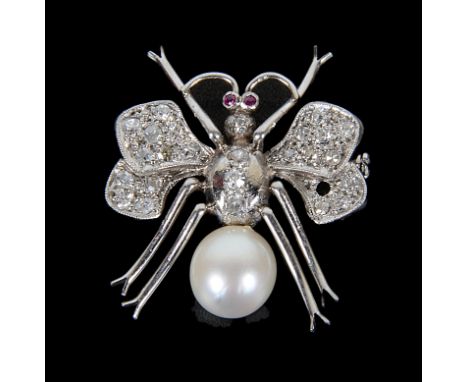 An Unmarked Platinum and Diamond Butterfly Brooch:Pretty jewellery insect brooch, ruby eyes and pearl and diamond set on pin 