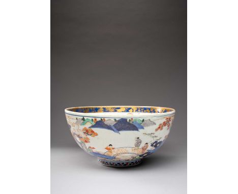 A LARGE JAPANESE IMARI BOWLEDO PERIOD, 17TH CENTURYThe deep body decorated in underglaze blue, gilt, yellow, red, orange, gre