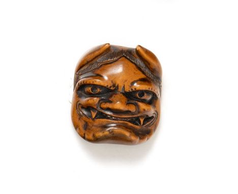 A JAPANESE DOUBLE-SIDED WOOD MASK NETSUKE EDO PERIOD, 18TH/19TH CENTURYCarved to one side with a horned oni, the demon depict