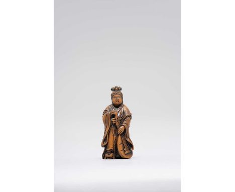 A MINIATURE WOOD NETSUKE OF BENTEN 20TH CENTURY  The diminutive Goddess is depicted standing, wearing long flowing robes and 