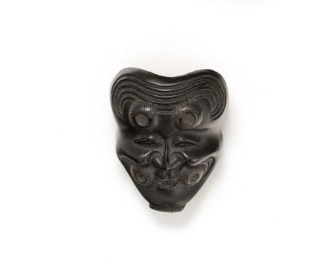 A JAPANESE LACQUERED WOOD MASK NETSUKE OF OKINA EDO/MEIJI, 19TH CENTURY  In the style of Ryuzan, the small face with an elong