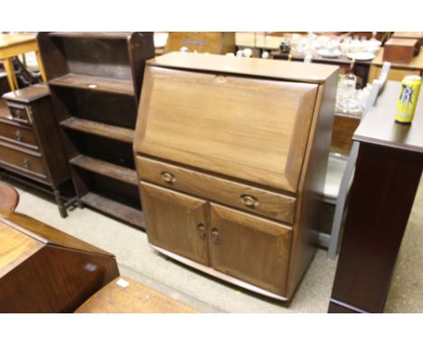 An Ercol bureau fitted single drawer