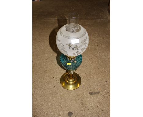 A Victorian brass oil lamp with turquoise glass reservoir