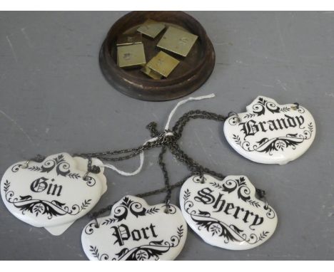 Turned wooden table snuff containing brass weights &amp; 4 ceramic decanter labels 
