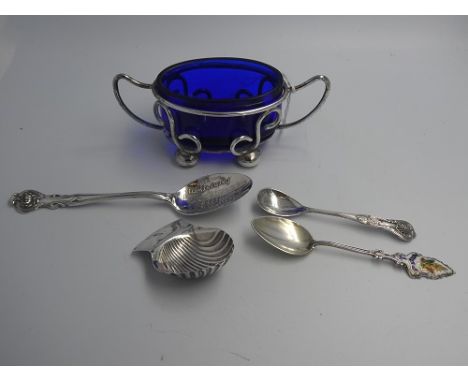 Collection of sterling silver items to include a salt with blue glass liner, caddy spoon etc