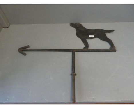 Metal weather vane with a Labrador nosing in the wind direction 