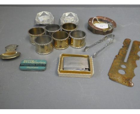 Collection of brass &amp; white metal items to include a button cleaner, napkin rings, ashtray etc 