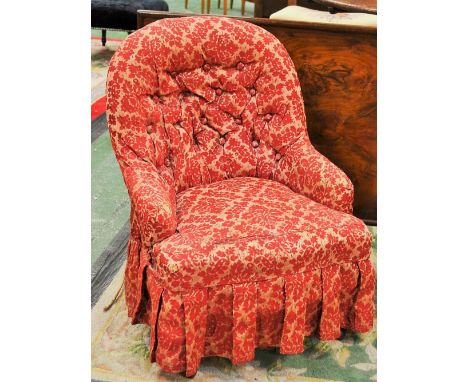 A Victorian childs button back upholstered chair, turned forelegs
