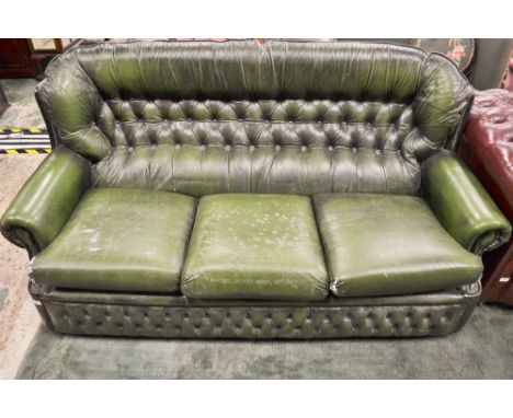 A green Chesterfield type three seater office/reception sofa, 185cm wide