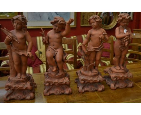 Ceramics - a set of terracotta coloured ceramic four seasons figures, on Rococo style bases, approx 70cm high