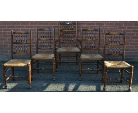 A set of five Lancashire ladder back rush seated dining chairs