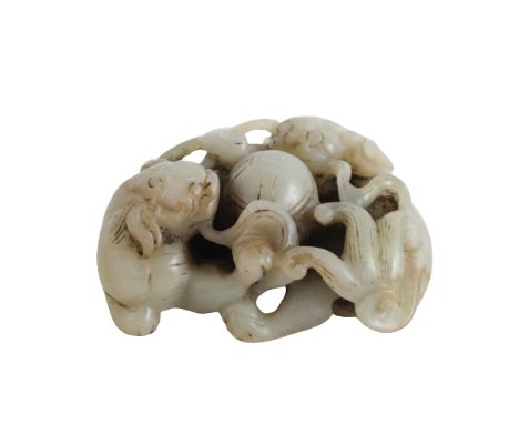 Chinese Translucent Celadon Jade Fu-Dog Group In a Qing Dynasty style. The animals with bushy tails engaged with a ball Size: