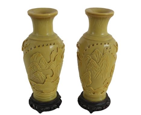 Pair of Peking Yellow Glass Vases Each vase-form opaque mustard yellow vessel with a green hue, carved on the exterior with w