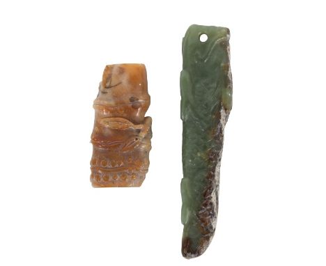 Two Chinese Jade Pendants. The first, a translucent moss green jade fish, tapering from top to bottom, with a gaping mouth, p