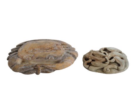 Two Chinese Carvings Comprising, an opaque white jade chilong atop an oval disc, with tones of brown, and a Sienna marble cra