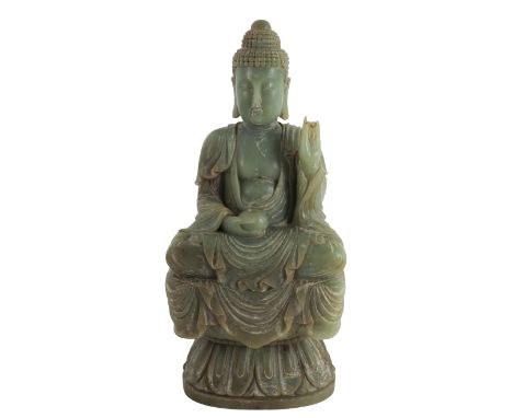 Large Chinese Celadon Jade Buddha. In a Ming Dynasty style. Seated upon a lotus base, with Ushnisha headdress, draped in a ro