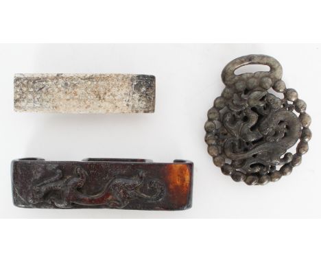 Two Chinese Jade Scabbard Slides &amp; Belt Clasp. The first, probably archaic, a calcified jade example with a raised half-b