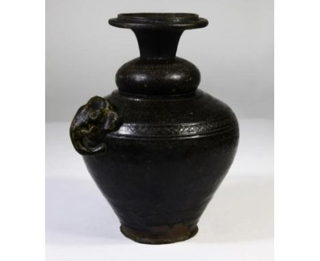 12th C. Stoneware Cambodian Khmer Black Glaze Jar Low-fired stoneware, covered with black glaze. This elegant vase with groov