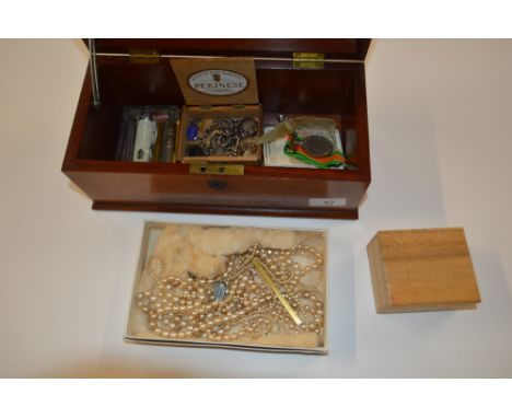 A mahogany box containing a WW2 Defence medal; various costume jewellery; a commemorative medal; a plated watch chain; pen kn