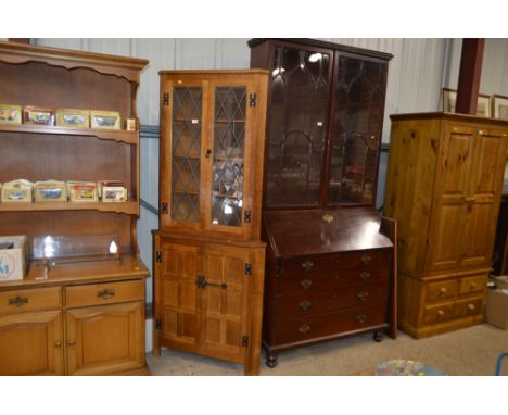 A good quality light oak and leaded glazed corner cupboard by Albert Eagleman 