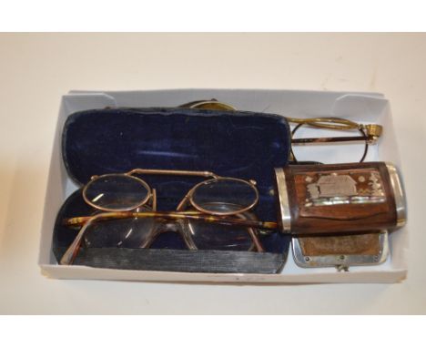 A box of old spectacles; and a white metal mounted snuff box etc.