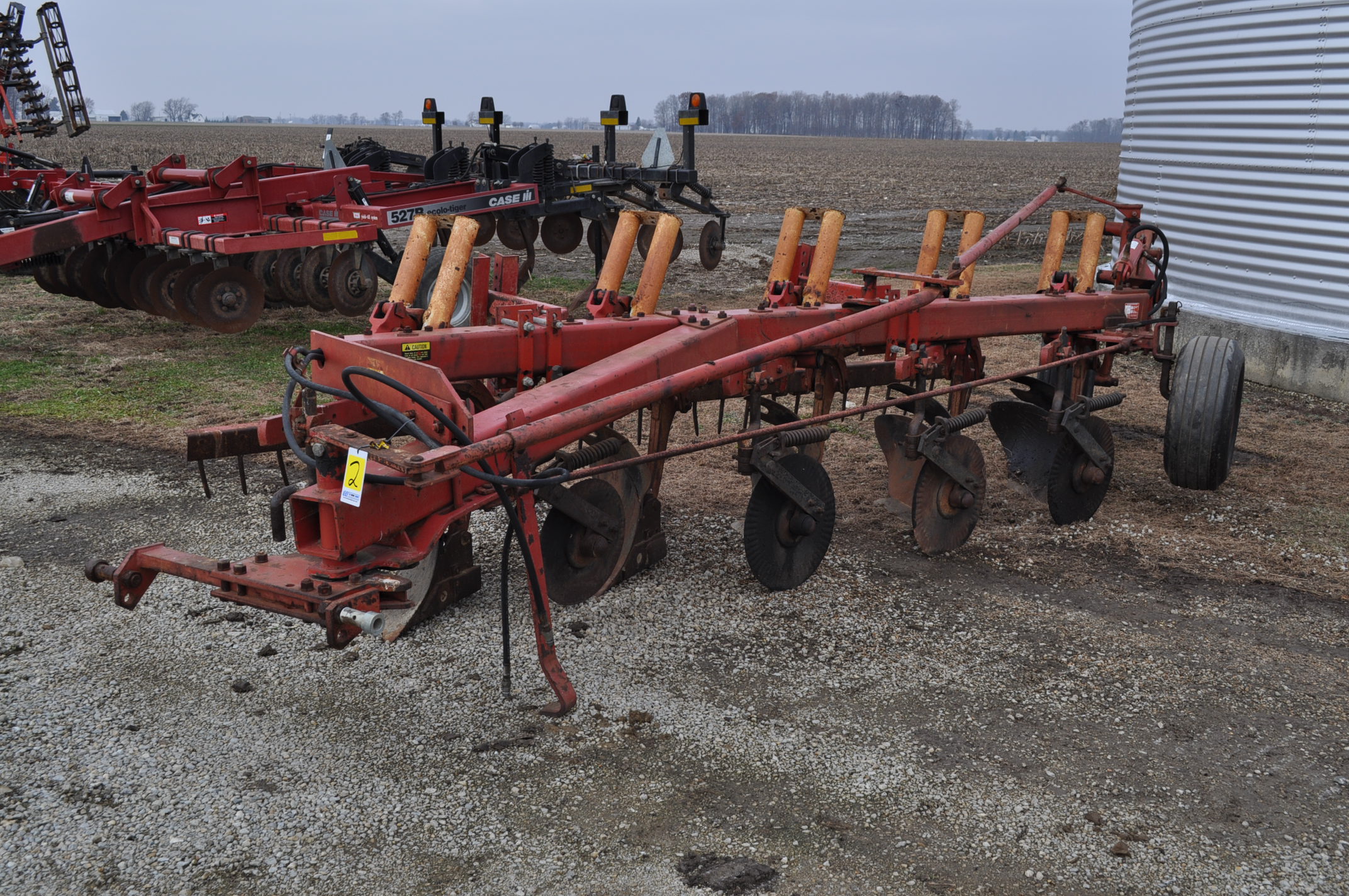 International 720 5x18 moldboard plow, auto reset, w/ buster bar harrow