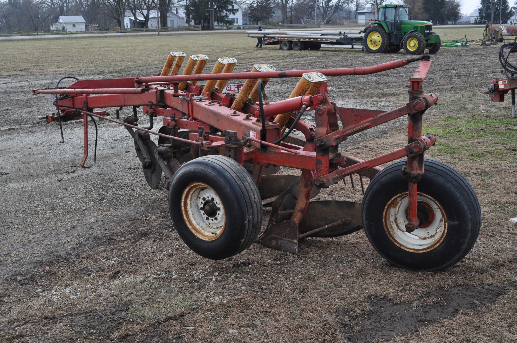 International 720 5x18 moldboard plow, auto reset, w/ buster bar harrow