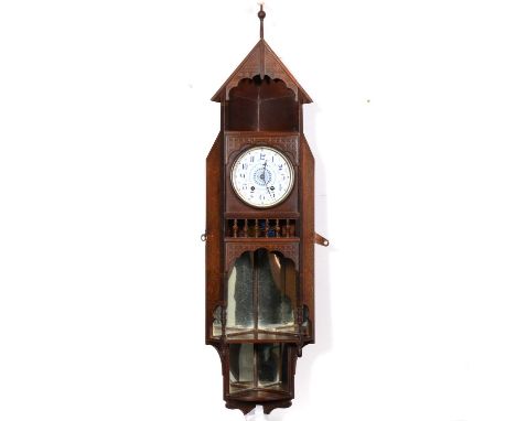 An Aesthetic Movement corner wall clock, the circular painted dial (as found) with Arabic numerals, housed in a walnut and gi