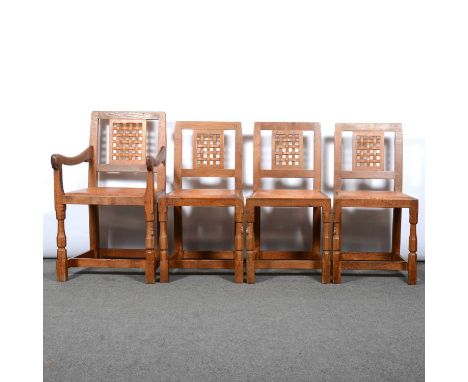 Robert 'Mouseman' Thompson of Kilburn, a set of four lattice back dining chairs, circa 1980, comprising one armchair and thre