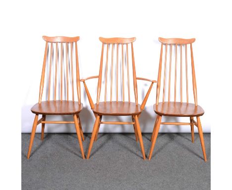 Ercol, set of six stick-back dining chairs, including two carvers, wavy top rails, height 97cm.