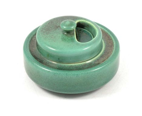 Ruskin Pottery, a circular squat inkwell and cover, mottled green glaze, oval factory 'West Smethick' mark and patent mark, d