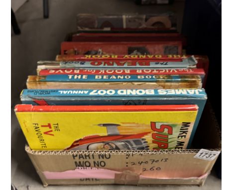 A quantity of children's annuals including Z cars, James Bond, Supercar etc.,