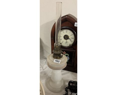 A Victorian milk glass oil lamp
