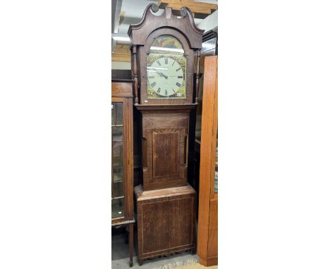An oak cased 30 hour long case clock with painted dial featuring hunting scene marked Jas Iddison, Kirkgy-Malzard.