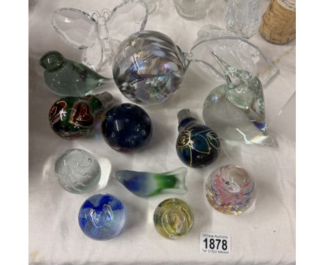 A quantity of paperweights and other glass ware including painted light bulbs
