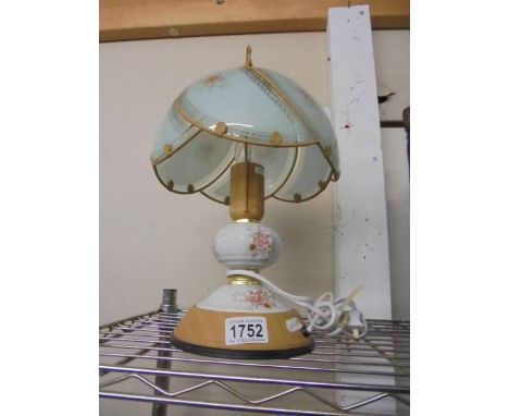 A modern table lamp with shade.