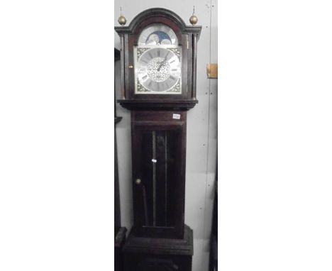 A mahogany long case clock.