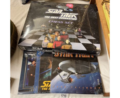 A new / unopened Star Trek Next Generation chess set and old Star Trek calendars