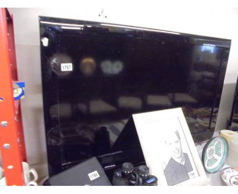 A Samsung television with remote.