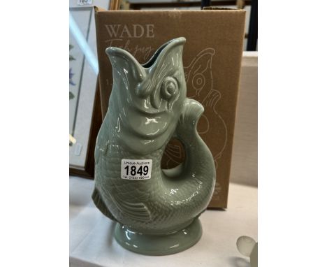 A boxed large Wade fish glug jug. Height 28cm