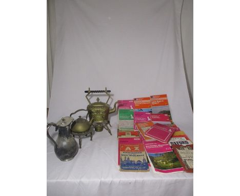 A brass Art Noveau spirit kettle on stand along with a pewter jug, collection of ordnance survey maps etc.