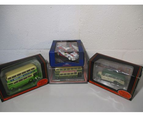 A collection of four die cast models including two exclusive first editions Leyland RTL Jersey Motor transport and Leyland PD