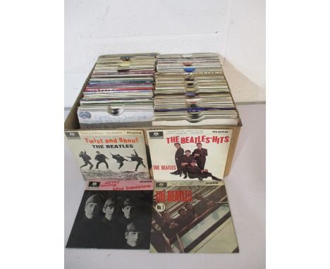 A large collection of 7" vinyl records including The Beatles, Elvis Presley, Queen, David Bowie, Rolling Stones, Rod Stewart,