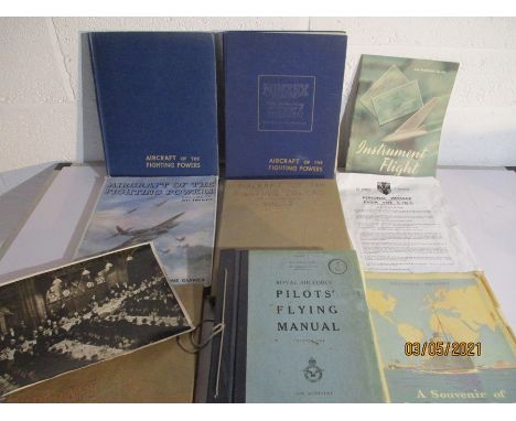 Five volumes of "Aircraft of the Fighting Powers" along with an RAF Pilots Flying manual etc.