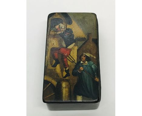An antique papermache snuff box, the top with handpainted comedic scene 
