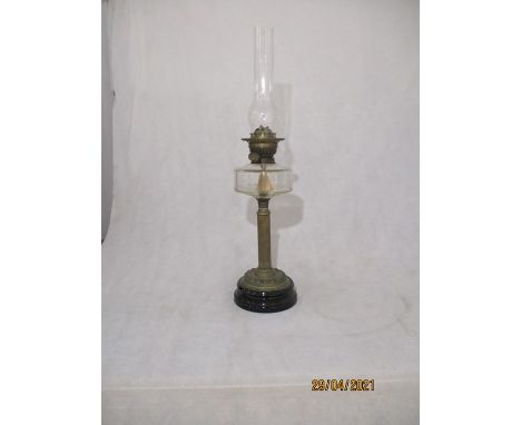 A Victorian clear glass oil lamp