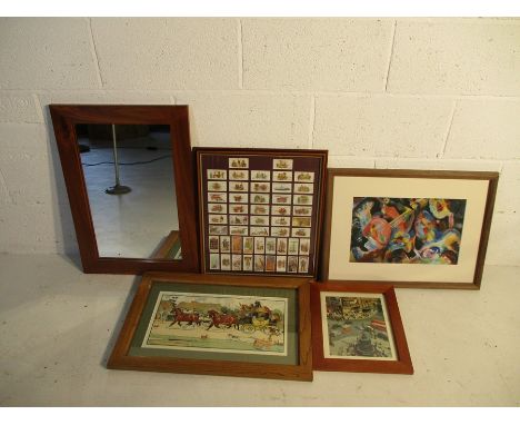 A framed collection of fire engine related cigarette cards, along with three framed pictures and mirror