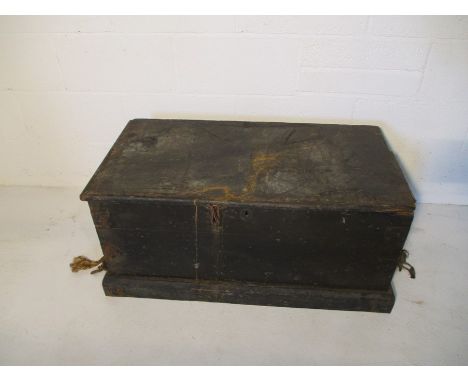 A large black tool chest, containing some tools