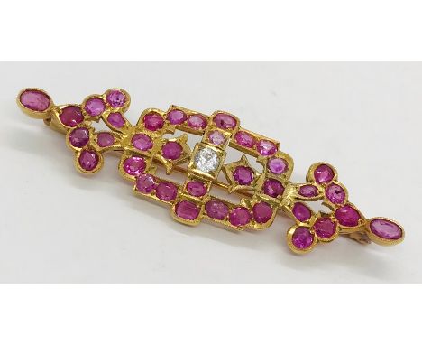 A ruby and diamond brooch set in 18ct gold ( tested)- total weight 6.5g